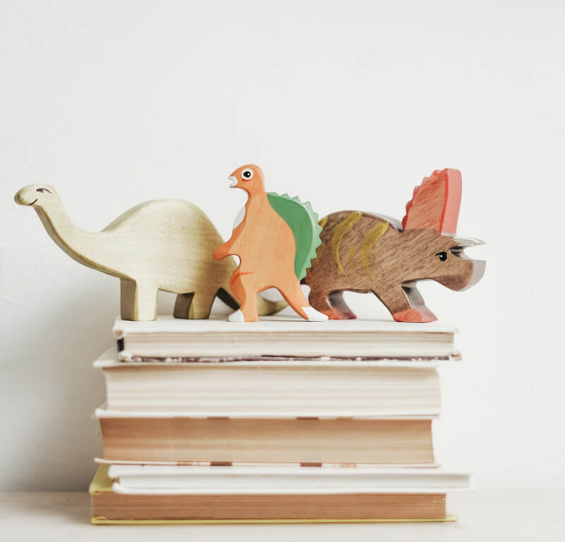 Wooden brachiosaurus, spinosaurus,and triceratops